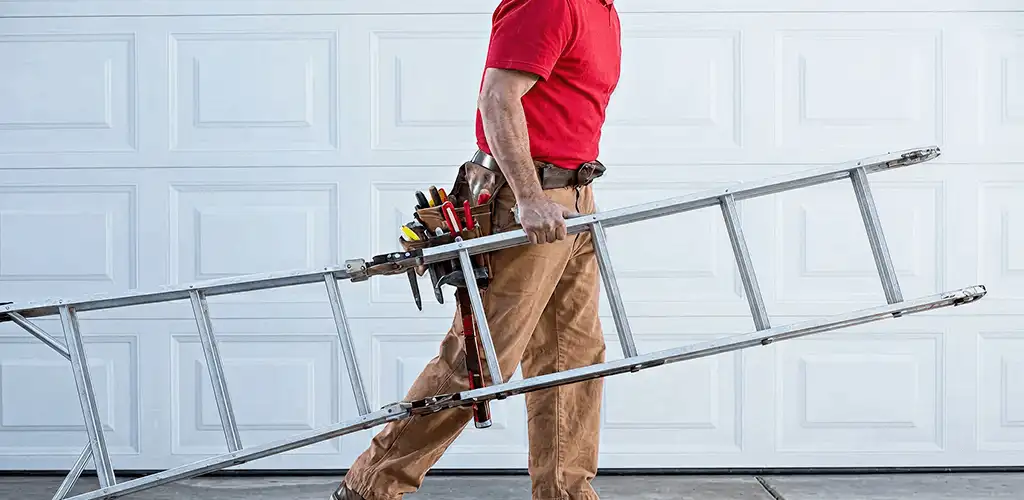 Garage door repair technician arriving with tools and ladder in Pueblo, CO